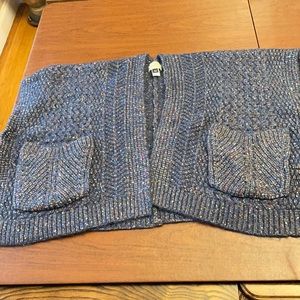 Knit multi color sleeveless sweater with pockets brand new